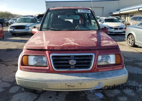 1997 Suzuki Sidekick Sport Js из США, поврежденный, VIN JS3TE21V6V4100299